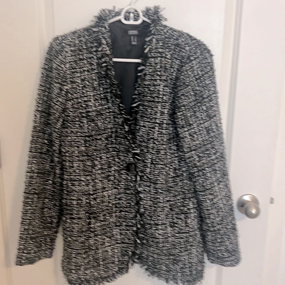 Black silver white overcoat looks great with jeans, dress pants and black dress